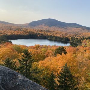 Mountain and pond in fall foliage